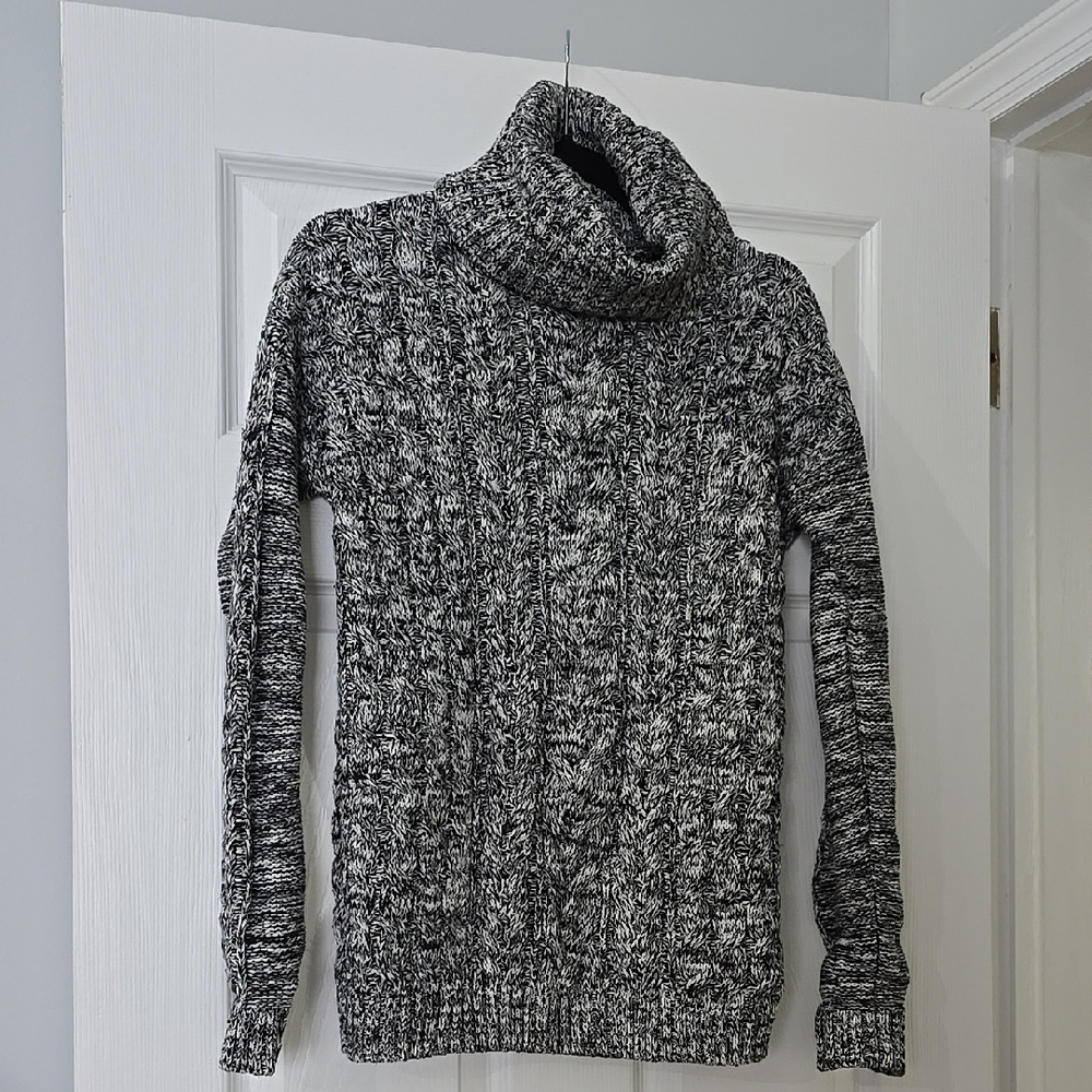 womans Black and White Turtleneck Sweater